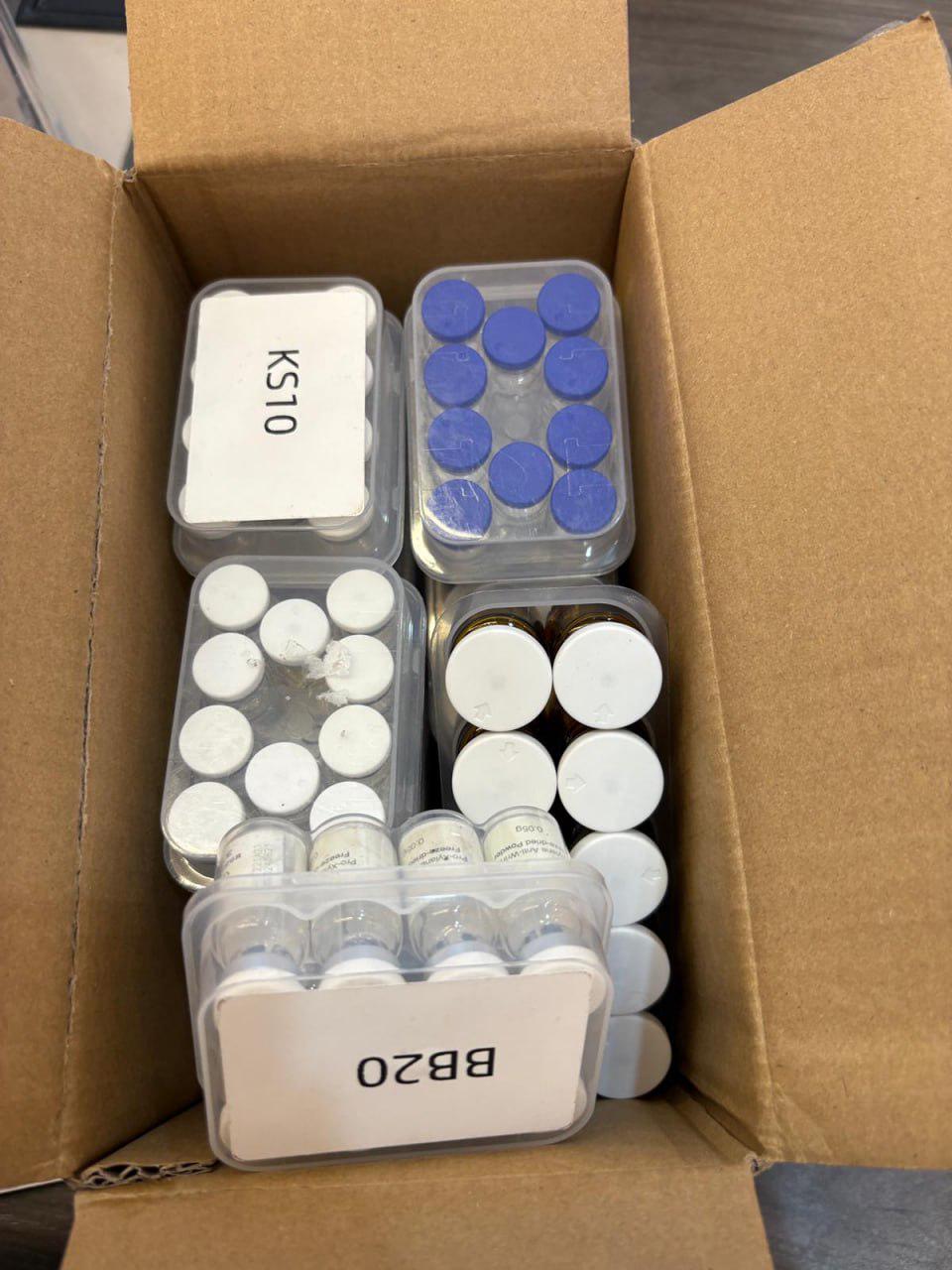 Peptide vials packaged in a shipping box with cold-chain protection